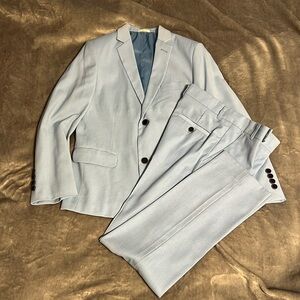 Used once. Excellent condition. Boys size 12 Calvin Klein light blue suit.